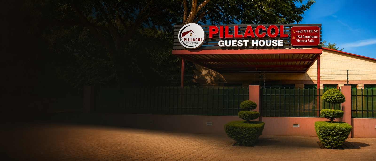 Pillacol Guest House exterior signage in Victoria Falls