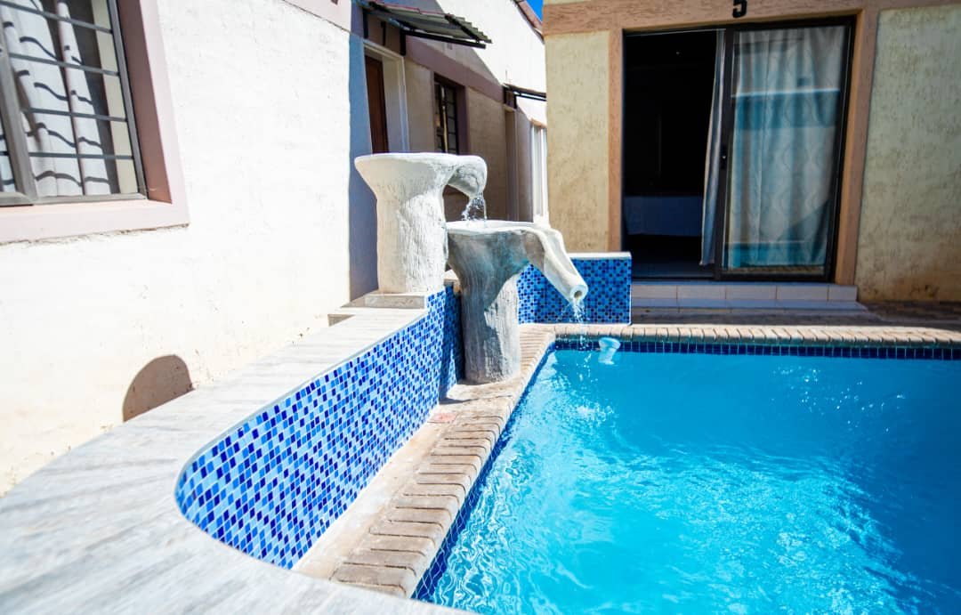 Pool and courtyard at Pillacol Guest House
